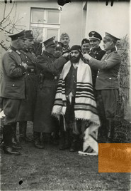 Image: Warta, presumably autumn 1939, The Rabbi’s son Hersz Laskowski is humiliated by men in German uniforms, Instytut Pamięci Narodowej, Warszawa